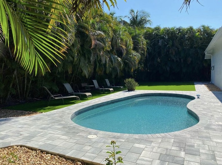 a pool with newly finished pavement